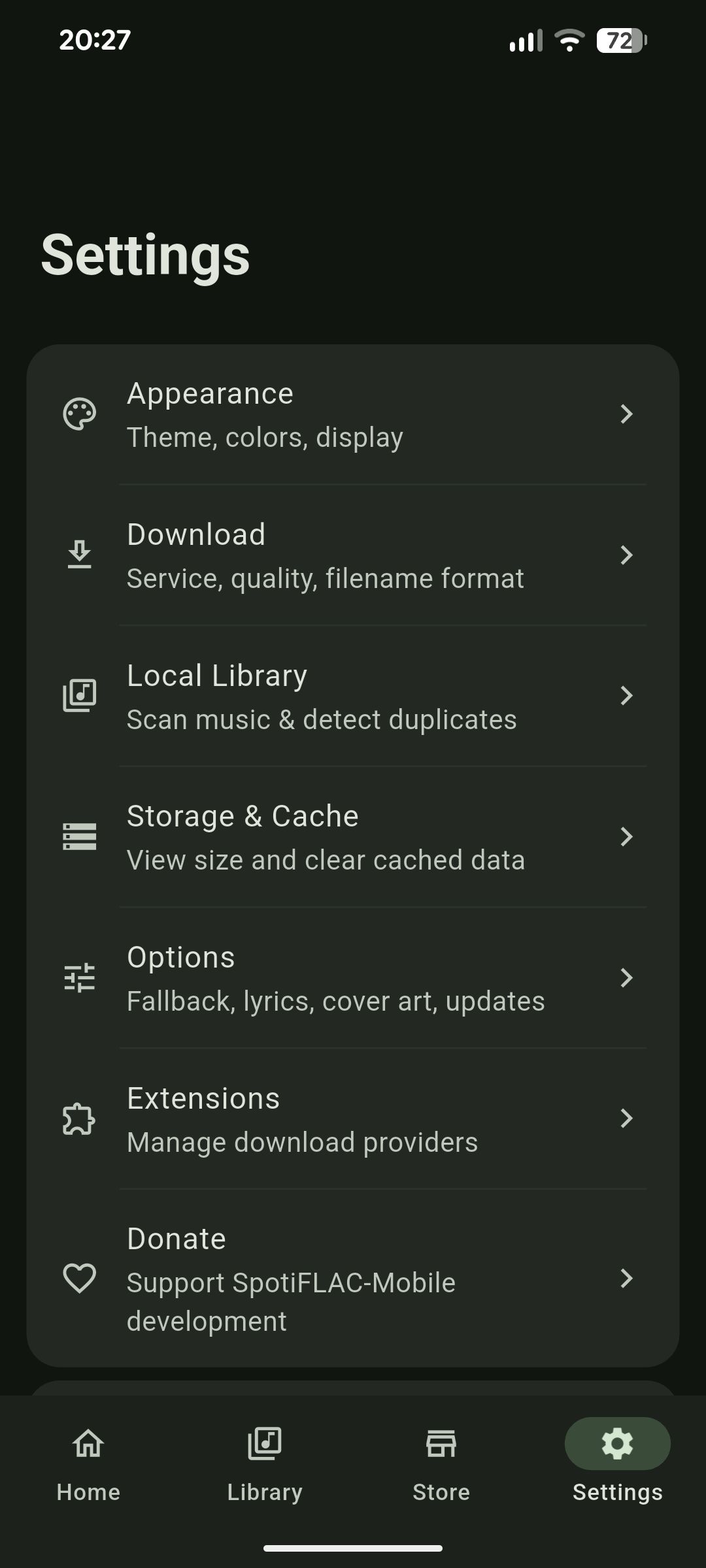 SpotiFLAC Mobile home screen showing the search bar to paste a Spotify URL and trending songs